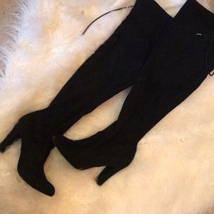 Over the knee heeled boots